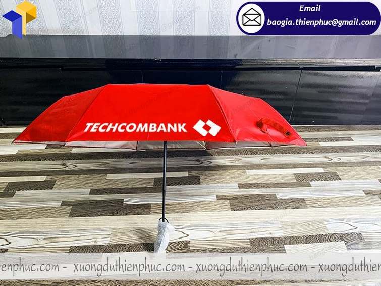 thiết kế dù cầm tay in logo cao cấp