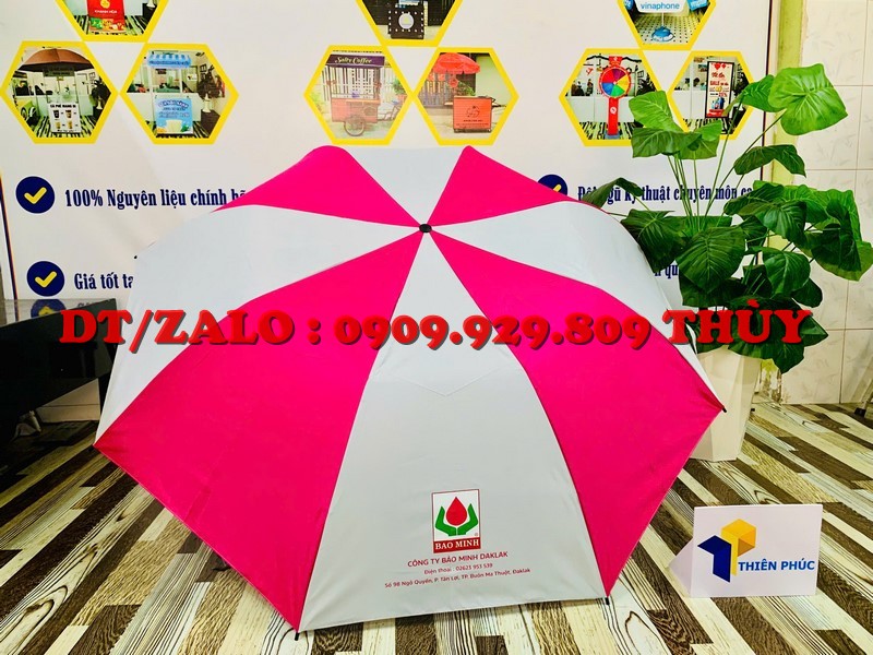 xưởng in dù cầm tay quảng cáo